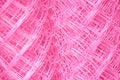 Fence rabitz closeup on a background in pink duotone. Abstract futuristic background