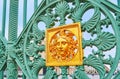 The fence of the Royal Palace with Medusa Gorgon gilt mask, Turin, Italy Royalty Free Stock Photo