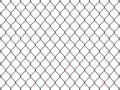 Fence from rusty mesh Royalty Free Stock Photo