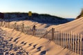 Fence on sand dune near the Atlantic ocean, Cape Cod, USA