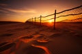 Fence in the sand with the sun setting behind it. Generative AI Royalty Free Stock Photo