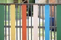 The fence of the school is in a colorful community. backgruond Royalty Free Stock Photo