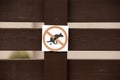 Fence with sign dogs fouling prohibited Royalty Free Stock Photo