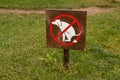 Fence with sign dogs fouling prohibited Royalty Free Stock Photo