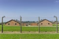 Fence surrounding residential buildings in Auschwitz-Birkenau concentration camp, Poland