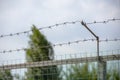 fence with two rows of barbed wire Royalty Free Stock Photo