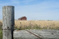 Fence View of Abandoned Homestead in Saskatchewan