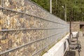 Fence - a wall over a water reservoir. Royalty Free Stock Photo