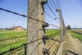 Fence and watchtower surrounding barracks in Auschwitz-Birkenau concentration camp, Poland