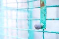 Fence and the wicket of the welded wire mesh green color with black round handle Royalty Free Stock Photo