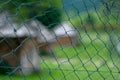 Fence on a wire farm with a blurred background Royalty Free Stock Photo