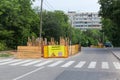 Fenced section of city street during of a roadworks Royalty Free Stock Photo