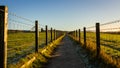 A fenced trail through agricultural land in the Scottish countryside in winter Royalty Free Stock Photo