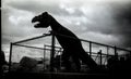 Fenced Tyrannosaurus sculpture