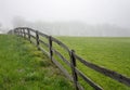 Fenceline, Field And Fog Royalty Free Stock Photo