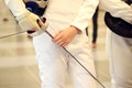 Fencer with fencing mask and rapier Royalty Free Stock Photo