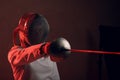 Fencer with fencing sword. Fencers duel concept. Royalty Free Stock Photo