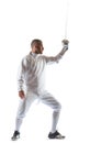 Fencing athlete wins the competition isolated in white background Royalty Free Stock Photo