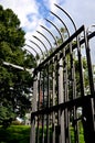 Fencing of building from forged bars with curved spikes. military guarded bases and an embassy with increased protection against o