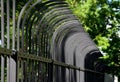 Fencing of building from forged bars with curved spikes. military guarded bases and an embassy with increased protection against o