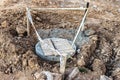 Fencing of the installed sewer hatch. Fenced sidewalk repair area. Security