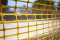 Fencing or protective mesh for marking or delimitation in a cons