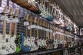 Fender Stratocaster guitar display at a music store. Strats are world renowned for their distinctive clean sound