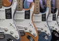 Fender Stratocaster guitar display at a music store. Strats are world renowned for their distinctive clean sound