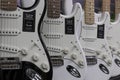 Fender Stratocaster guitar display at a music store. Strats are world renowned for their distinctive clean sound