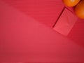 inspirational chinese new year concept image of red envelope and oranges in red colour background