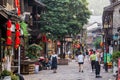 FENGHUANG, CHINA - AUGUST 13, 2018: Crowded cobbled street in Fenghuang Ancient Town, Hunan province, Chi Royalty Free Stock Photo