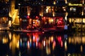 Fenghuang, China - May 14, 2017: People in food court on riverside near Phoenix Hong Bridge in Fenghuang