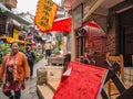 Tourist walking in alley building district of Fenghuang ancient town.