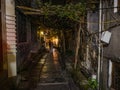 Tourist walking in alley building district of Fenghuang ancient town