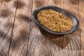 Fenugreek organic seeds in the wooden bowl - Trigonella foenum-graecum Royalty Free Stock Photo
