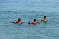 Fenwick Island, Delaware, U.S - July 8, 2023 - Three young boys floating on their surf boards by the beach