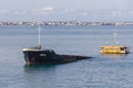 Close-up of Greek bulk carrier ship that was thrown by storm in shallow water near Genoese fortress in Feodosia.