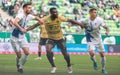 Ferencvaros midfielder Anderson Esiti against Zalaegerszeg players Kalnoki Kis David and Daniel Zsori during Hungarian OTP Bank