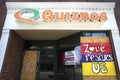 Ferguson, Missouri, USA, June 20, 2020 - Love sign painted on boarded up windows of Quiznos after police brutality riots