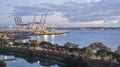 Fergusson Container Terminal Judges Bay Auckland, New Zealand in sunrise Royalty Free Stock Photo