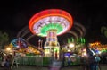 Feria juegos mecanicos light trail rides night long exposure Royalty Free Stock Photo