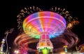 Feria juegos mecanicos light trail rides night long exposure fireworks Royalty Free Stock Photo