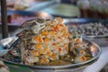 Ferment crab in aluminium trey on street food of Bangkok, Thailand Royalty Free Stock Photo