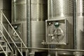 Fermentation in progress. Tankers for fermenting wine inside a wine factory. Royalty Free Stock Photo