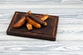 Fermented bananas on wooden board. Overripe brown fruits is suitable for baking tasty vegan banana bread Royalty Free Stock Photo