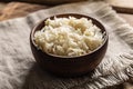 Fermented cabbage in a bowl on wooden cutting board