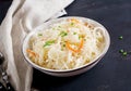 Fermented cabbage. Vegan food. Sauerkraut with carrot and spices in bowl