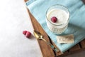 Fermented drink kefir in a glass jar on a light background. Probiotic cold fermented dairy drink Royalty Free Stock Photo
