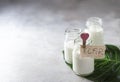 Fermented drink kefir in a glass jar on a light background. Probiotic cold fermented dairy drink