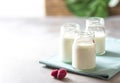 Fermented drink kefir in a glass jar on a light background. Probiotic cold fermented dairy drink Royalty Free Stock Photo